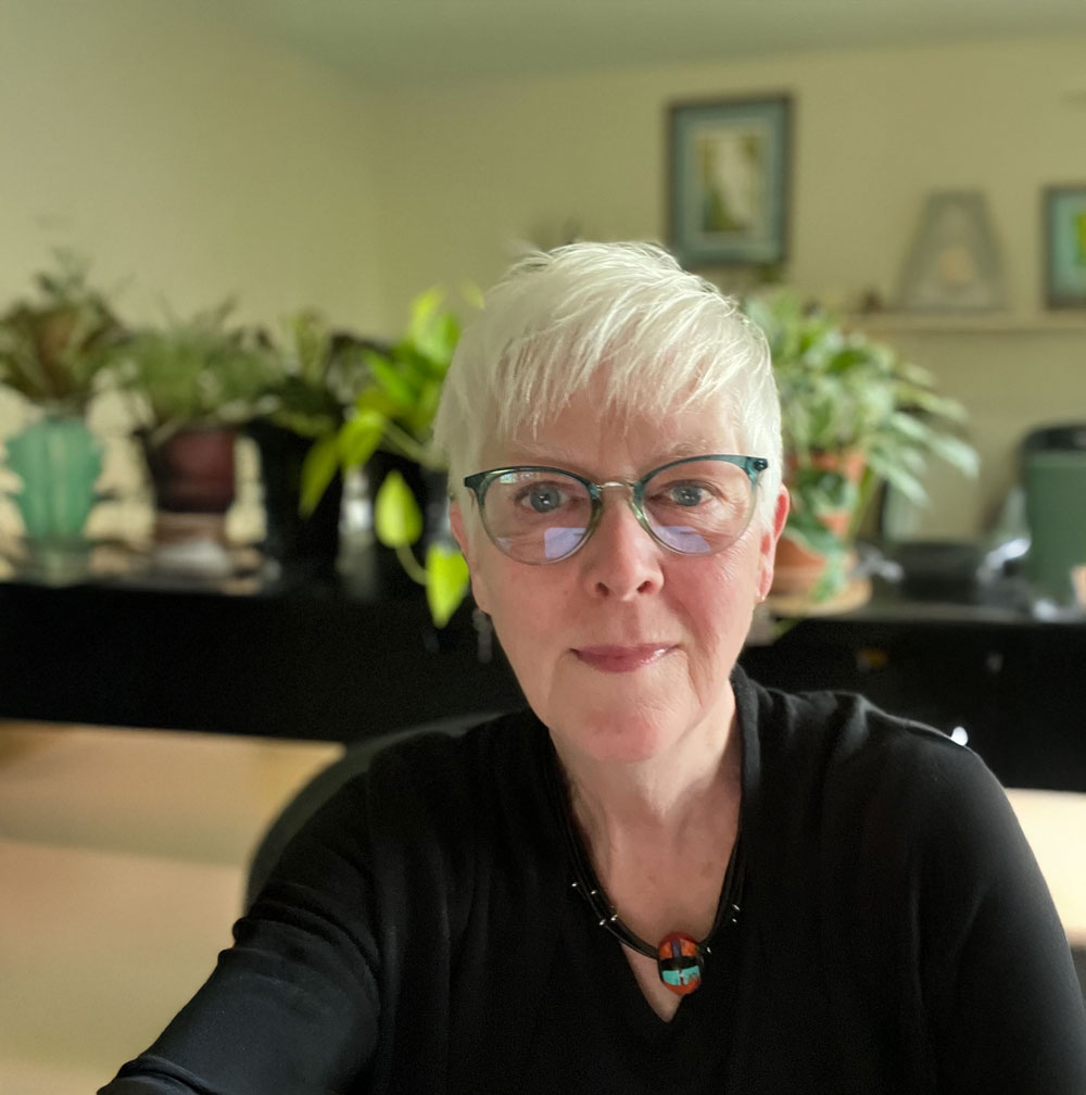 Esther at her desk